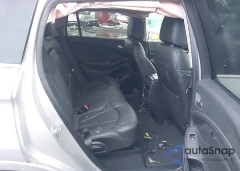 2016 Buick Envision Premium I z USA, uszkodzony, nr VIN LRBFXESX1GD214560